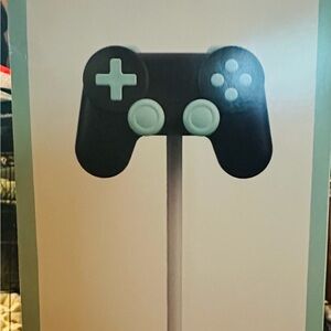 HEADPHONE HOLDER THE BOX HAS A LITTLE DAMAGE BUT THE PRODUCT IS NOT DAMAGED